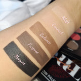 Close up swatches Twin Soul palette black, browns and nudes mattes on skin